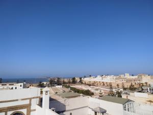 an aerial view of a city with buildings at RIAD MAROSKO in Essaouira
