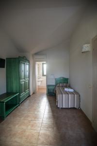 A bed or beds in a room at Le Vanille