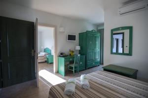 A bed or beds in a room at Le Vanille Még 37 kép
