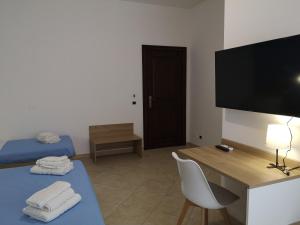Postel nebo postele na pokoji v ubytování Villa Gaia
