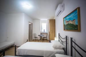 Posteľ alebo postele v izbe v ubytovaní Around Lago Maggiore rooms