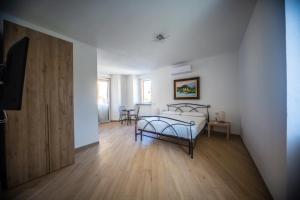 Posteľ alebo postele v izbe v ubytovaní Around Lago Maggiore rooms