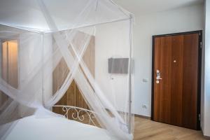 Posteľ alebo postele v izbe v ubytovaní Around Lago Maggiore rooms
