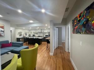 a living room with a couch and a dining room at Kaleden Guest Suite in Okanagan Falls