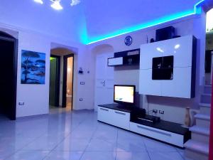 TV a/nebo společenská místnost v ubytování INTERNO 13 Apartament