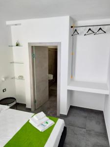 Postel nebo postele na pokoji v ubytování B&b Leo