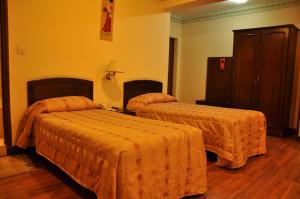 Voodi või voodid majutusasutuse Tibet Guest House toas