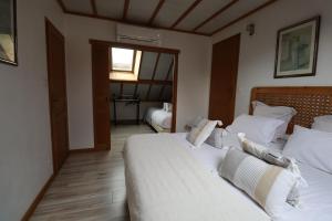 Postel nebo postele na pokoji v ubytování gite des 3 rivières
