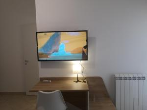TV a/nebo společenská místnost v ubytování Villa Gaia