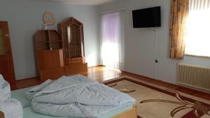Łóżko lub łóżka w pokoju w obiekcie Apartment Monsberger