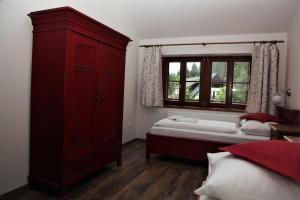 Postel nebo postele na pokoji v ubytování Aparthotel Mádr