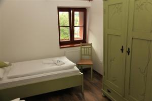 Postel nebo postele na pokoji v ubytování Aparthotel Mádr