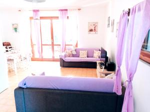 Posteľ alebo postele v izbe v ubytovaní Purple House - Arboriamar Platamona