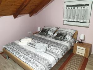 Postel nebo postele na pokoji v ubytování Vila Max
