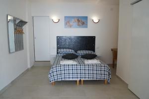 Posteľ alebo postele v izbe v ubytovaní Total sea View Grimaldi