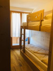 A bed or beds in a room at Casa dei Tabachi Még 22 kép