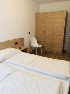 A bed or beds in a room at Casa dei Tabachi