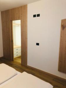 A bed or beds in a room at Casa dei Tabachi