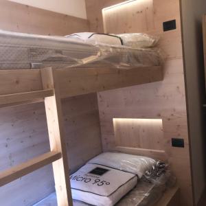 A bed or beds in a room at Casa dei Tabachi