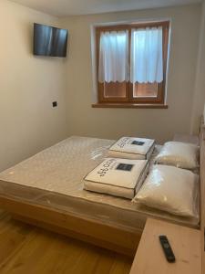 A bed or beds in a room at Casa dei Tabachi