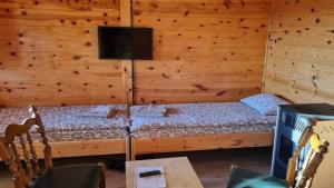 Postel nebo postele na pokoji v ubytování Kod Elka