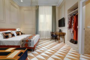 Кровать или кровати в номере YourHome - Maison Iovino Luxury Rooms