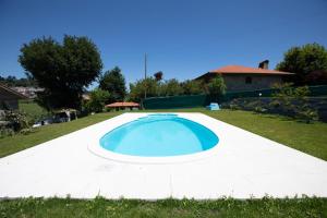 A piscina localizada em Quinta de Carvalhal - Casa de Campo ou nos arredores