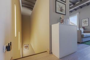 A bed or beds in a room at Ricasoli 34 House by 360Rentals