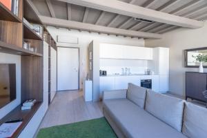 A television and/or entertainment centre at Ricasoli 34 House by 360Rentals