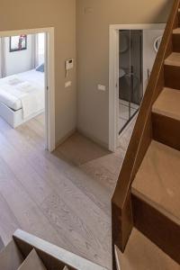 A bed or beds in a room at Ricasoli 34 House by 360Rentals