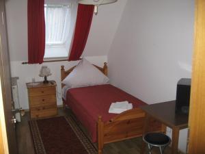 Een bed of bedden in een kamer bij Syrtaki bei Nikos