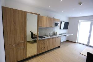 Kuchyň nebo kuchyňský kout v ubytování Boardinghouse Schellenberg