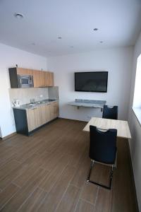 Kuchyň nebo kuchyňský kout v ubytování Boardinghouse Schellenberg