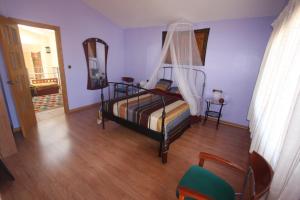 Cama o camas de una habitación en Fantastica Villa a 700 metros de la playa Dar Unai