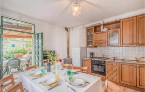 A kitchen or kitchenette at Case Sparse San Savino Még 12 kép
