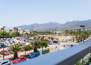 a view from a balcony of a parking lot at Pensión Alcalá in Alcalá