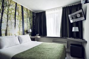Postel nebo postele na pokoji v ubytování Hotel Zuid