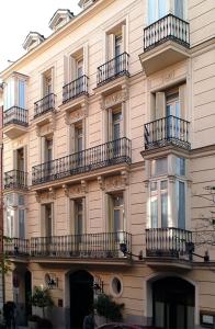 a building with balconies on the side of it at Relais & Châteaux Hotel Orfila in Madrid