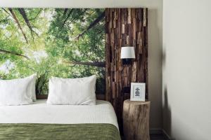 Postel nebo postele na pokoji v ubytování Hotel Zuid