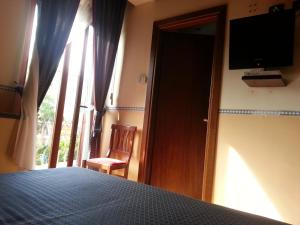 Letto o letti in una camera di Hotel Il Barocco