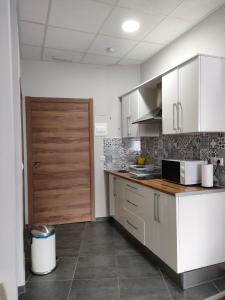 Kuchyň nebo kuchyňský kout v ubytování Apartamento Acogedor + 7 fotografií