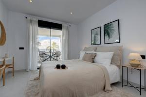 Posteľ alebo postele v izbe v ubytovaní 2 Bedroom Apartment @Estepona Hills With Sea View! + 31 fotografií