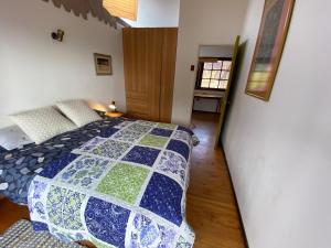 Postel nebo postele na pokoji v ubytování Casona Girasol - BBQ Cocina Piscina Wifi