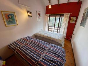 Postel nebo postele na pokoji v ubytování Casona Girasol - BBQ Cocina Piscina Wifi