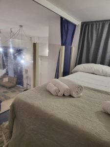 Postel nebo postele na pokoji v ubytování Baglio San Basilio