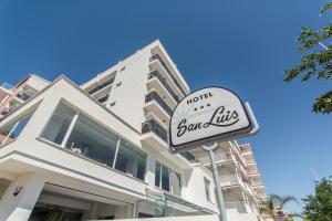 a sign for a hotel called sound life in front of a building at Hotel San Luis in Gandía