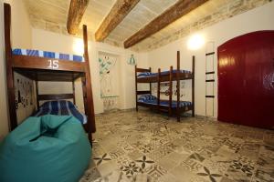 Postel nebo postele na pokoji v ubytování Vallettastay Dormitory shared hostel + 9 fotografií