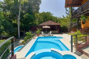 Bazén v ubytování Villa Bayacanes con piscinas privadas nebo v jeho okolí