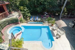 Bazén v ubytování Villa Bayacanes con piscinas privadas nebo v jeho okolí