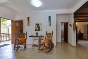 Posezení v ubytování Villa Bayacanes con piscinas privadas